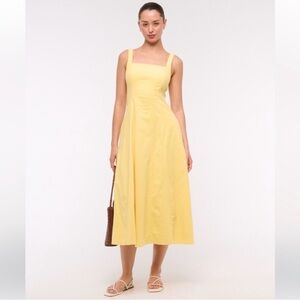 The AF Mila Stretch dress size small tall yellow